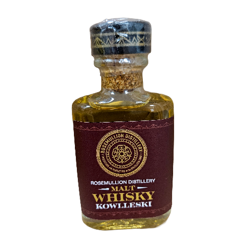 A small glass bottle of Kowlleski Rosemullion Distillery Malt Whisky, filled with golden amber liquid and featuring a dark maroon label with gold lettering, sealed with a patterned black cap.