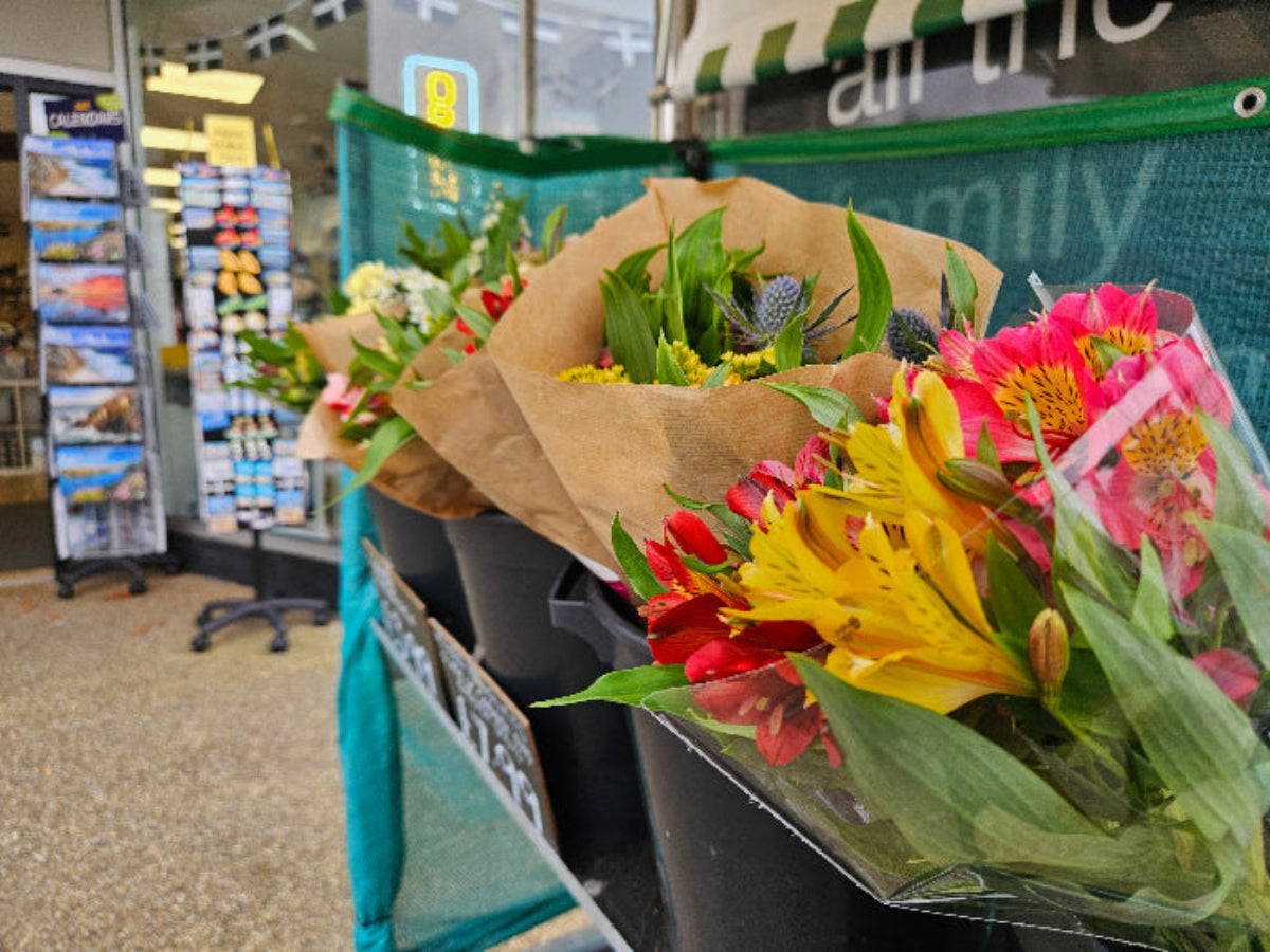 colourful bouquets outside a shop 