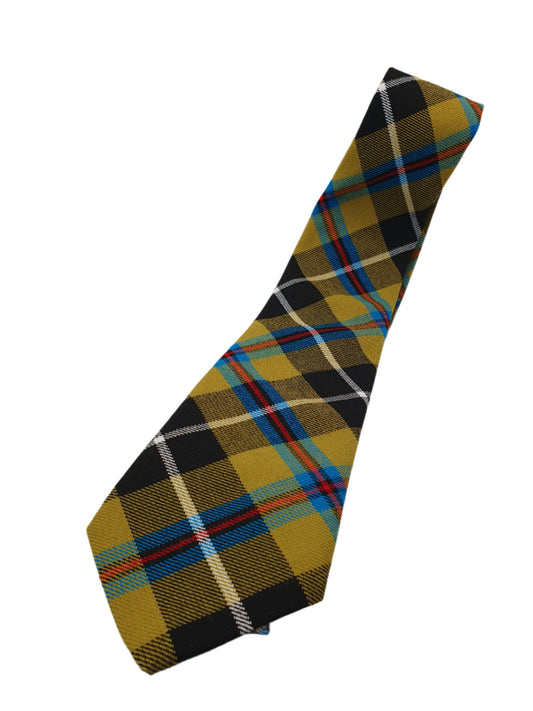 A necktie with a Cornish Tartan pattern in multiple colors, primarily yellow, black, and blue.